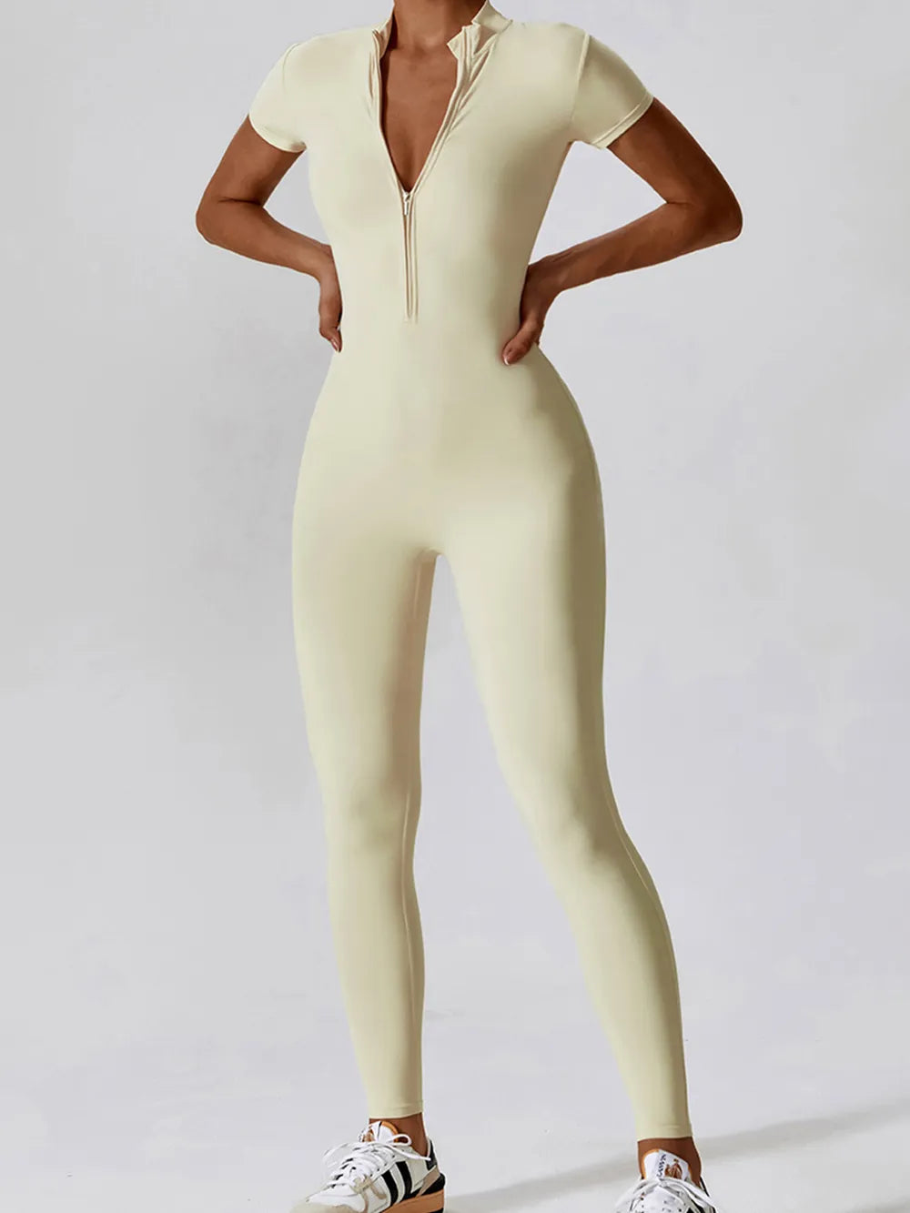 Basic Bae Half Zip Short Sleeve Active Jumpsuit - Fashorio