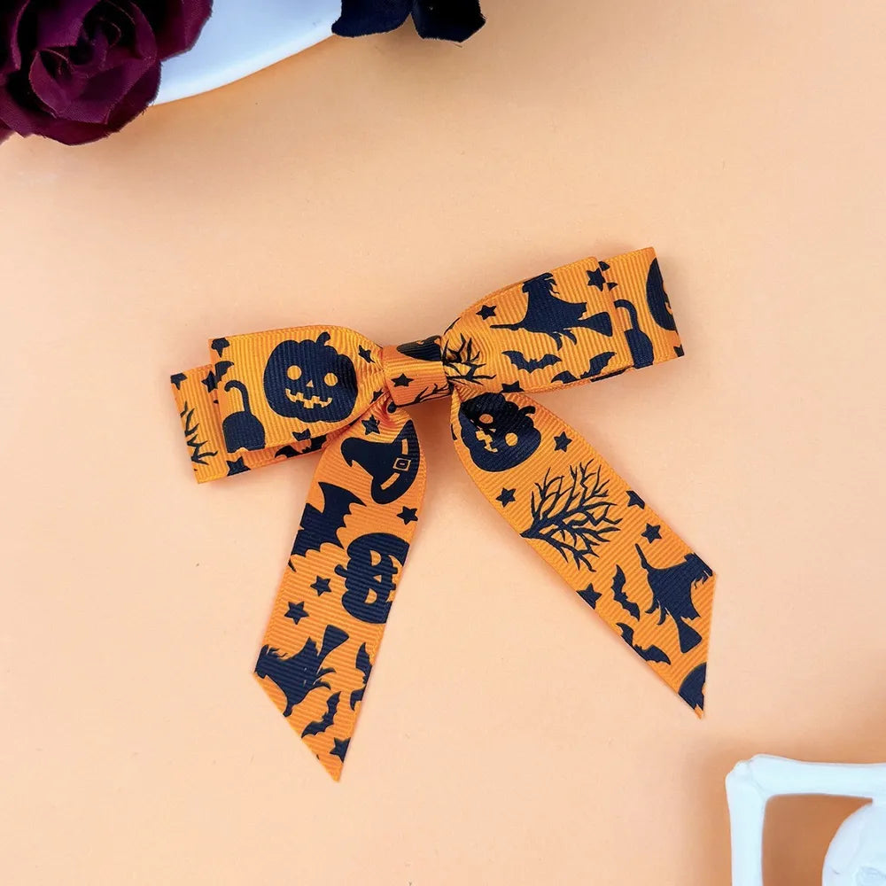 2-Piece Polyester Bow Hair Clip Tangerine One Size - Fashorio