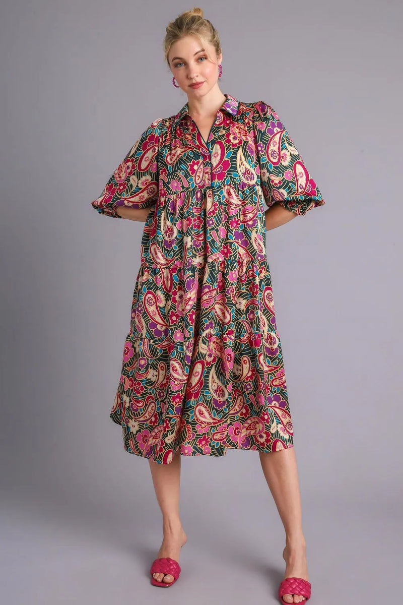 A model wearing women's satin dresses from the Fashorio collection