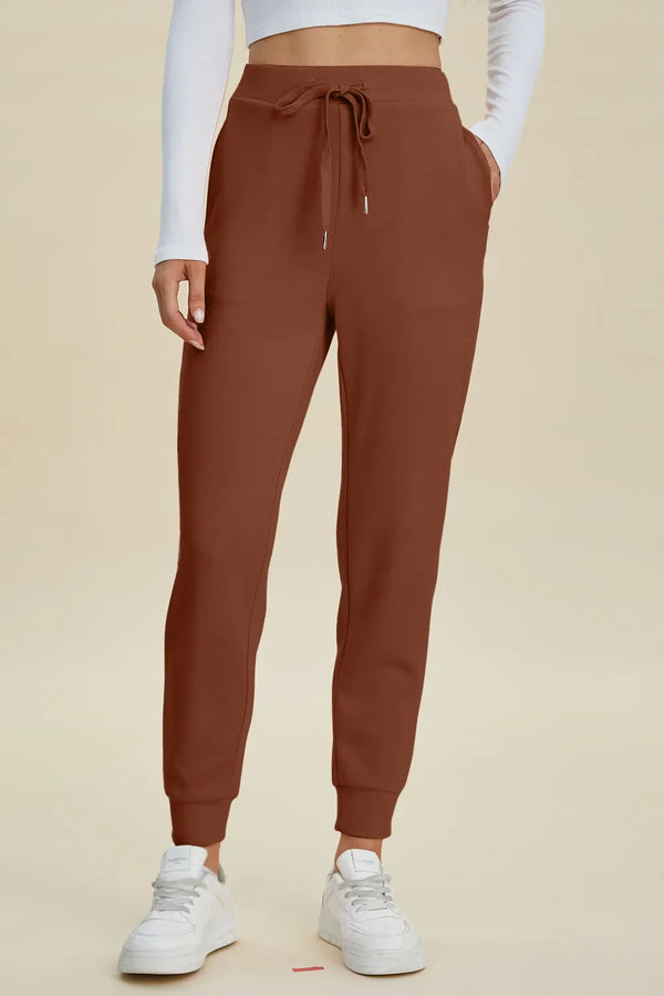 A model wearing women's joggers from the Fashorio collection
