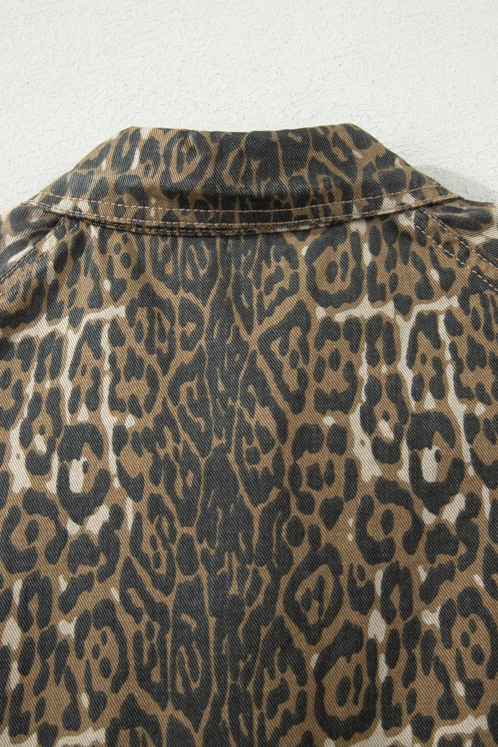 Leopard print puff sleeve denim mini dress detail view