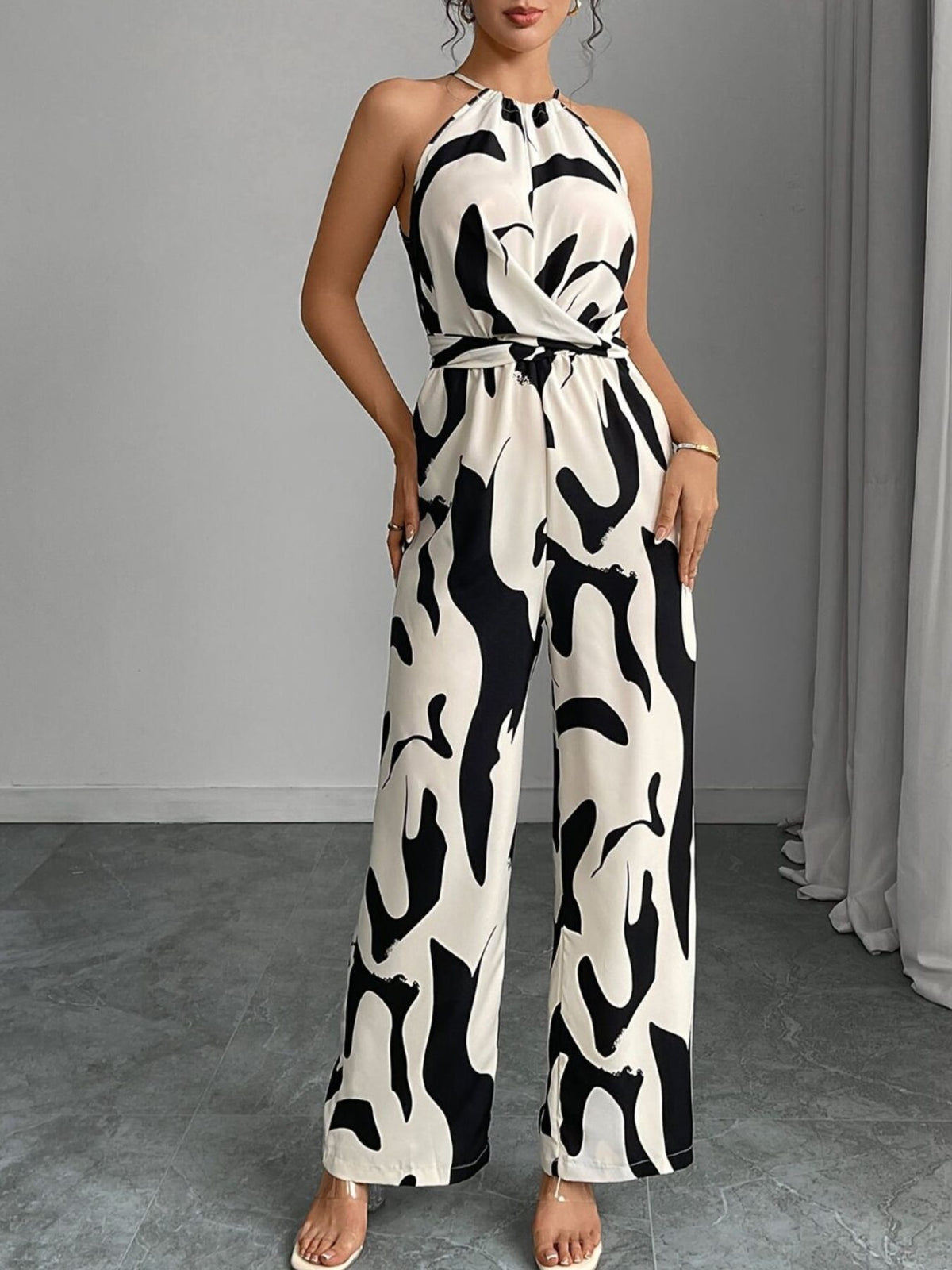 Wide leg jumpsuit showing abstract print detail