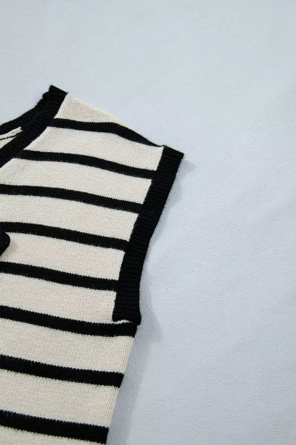 Bow applique short sleeve sweater styled with trousers