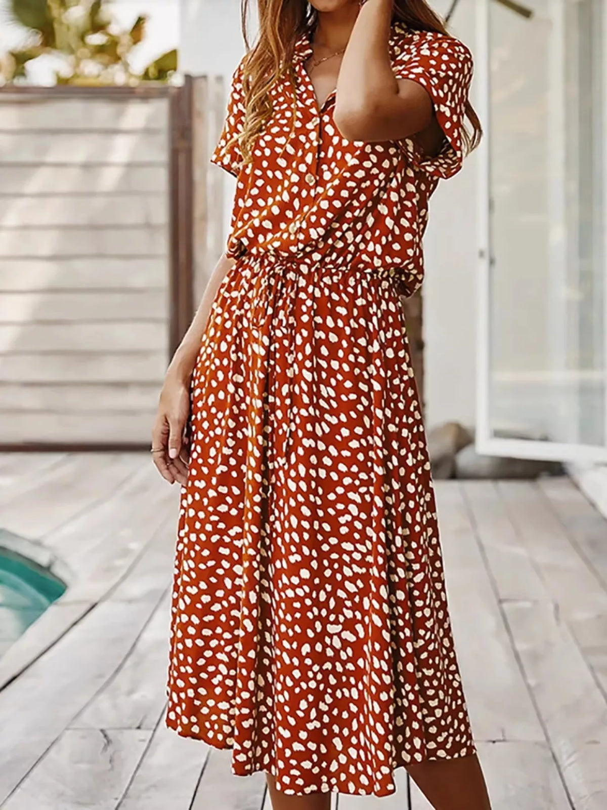 Polka dot button front midi dress back view