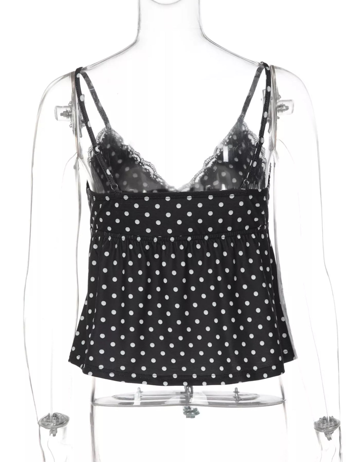 Polka dot print fabric close up in black