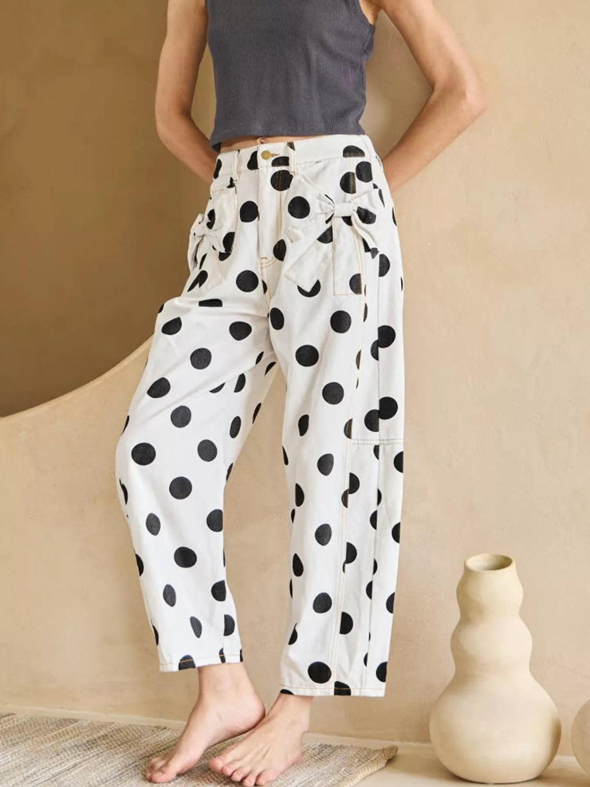 White polka dot high waist jeans front view
