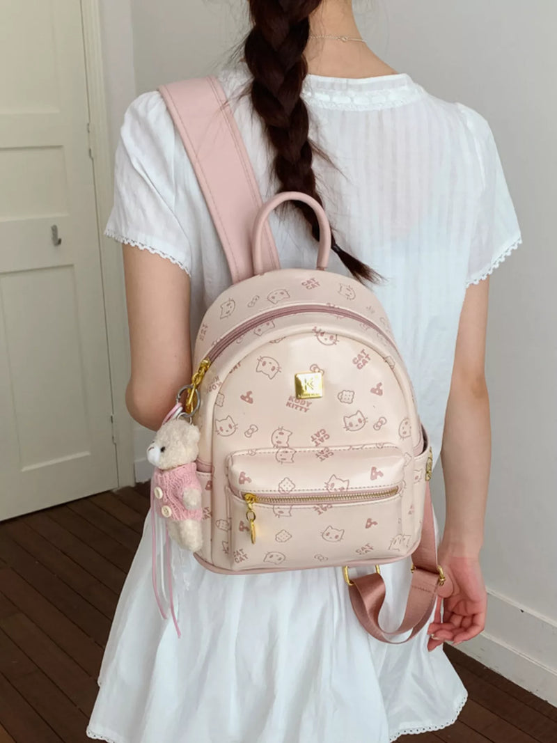 Cartoon pattern mini backpack with bear pendant front view