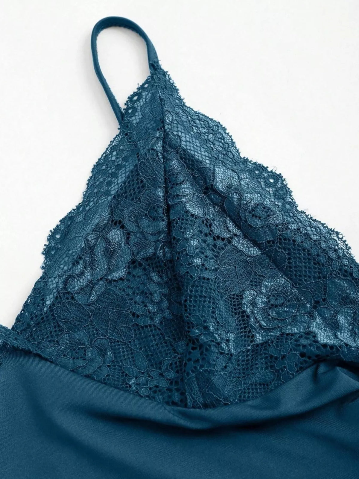 Detail of the ruched fabric texture across the bodice