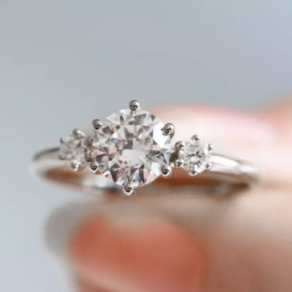 Sterling silver moissanite adjustable ring angled view
