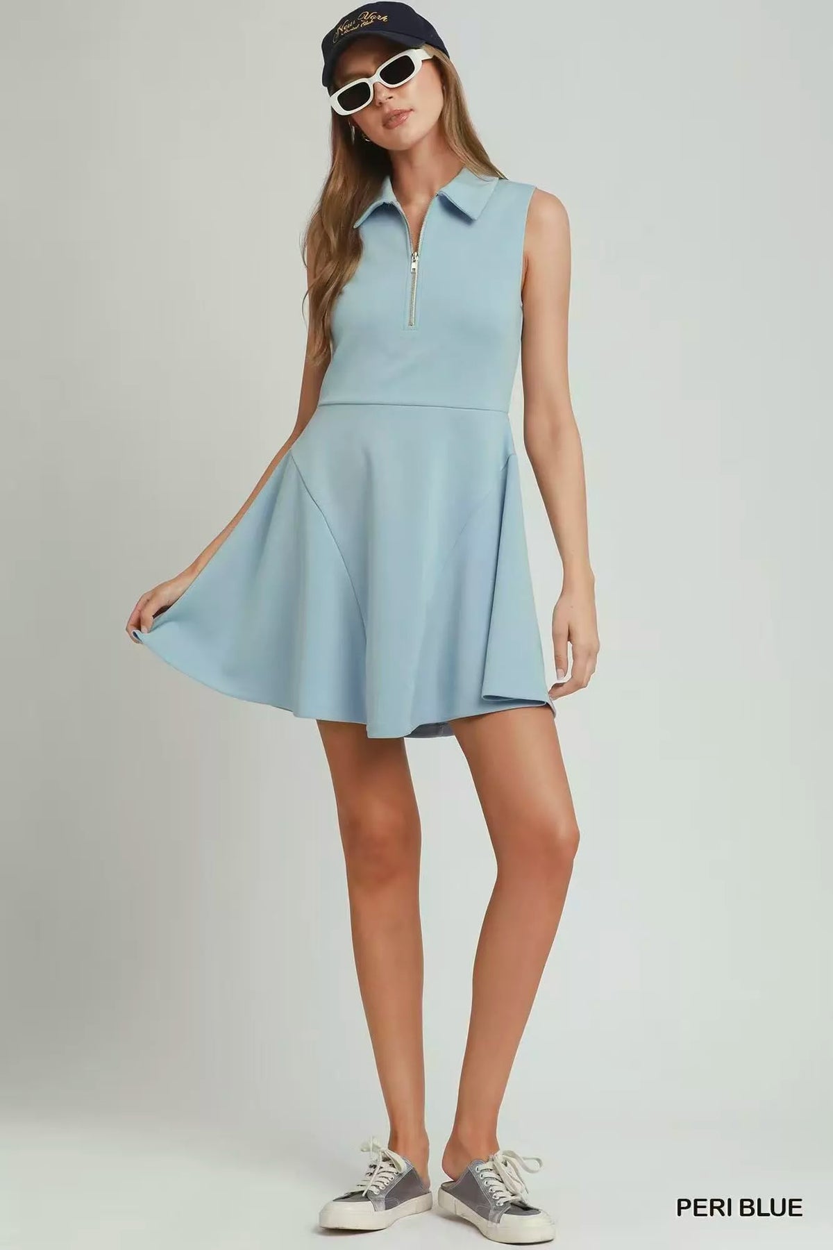 Peri blue collared quarter zip tennis dress front view