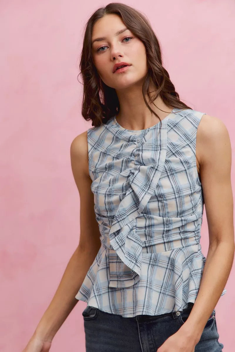Blue plaid sleeveless ruffle peplum top front view