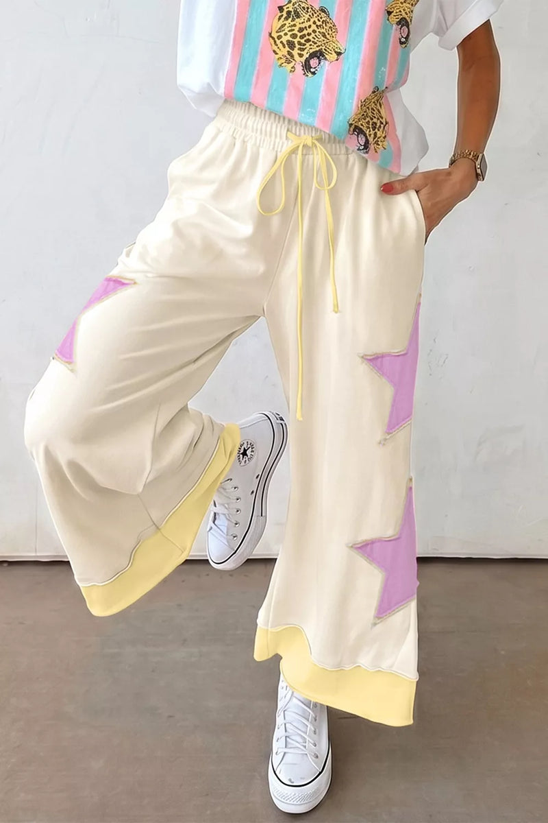 Cream star patch wide leg pants front view