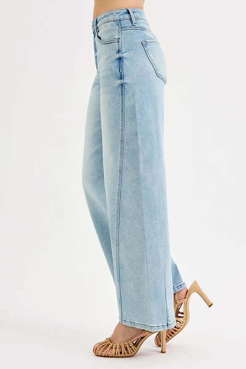 Barrel leg shape on light wash denim