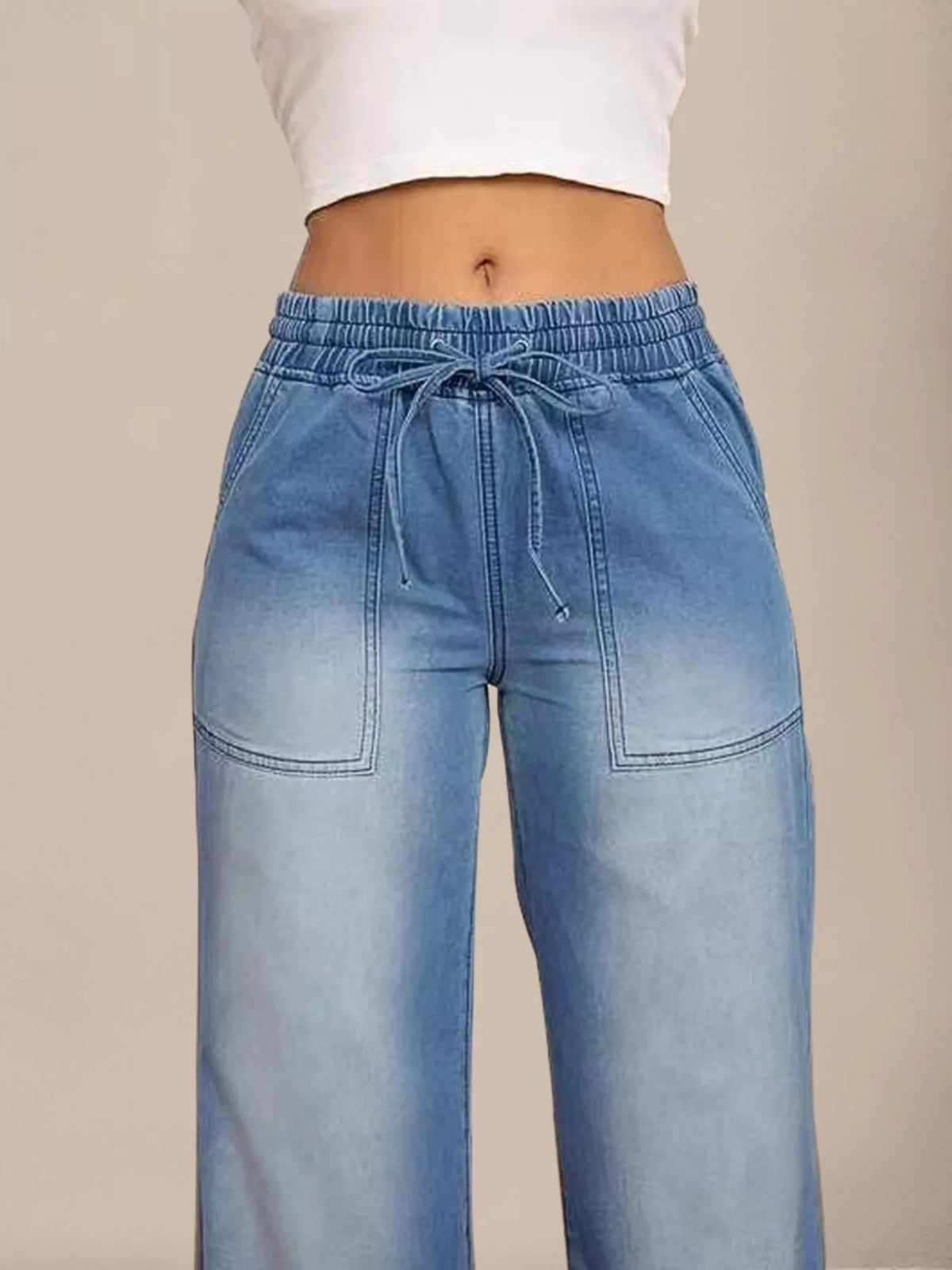 Drawstring jeans pocket detail