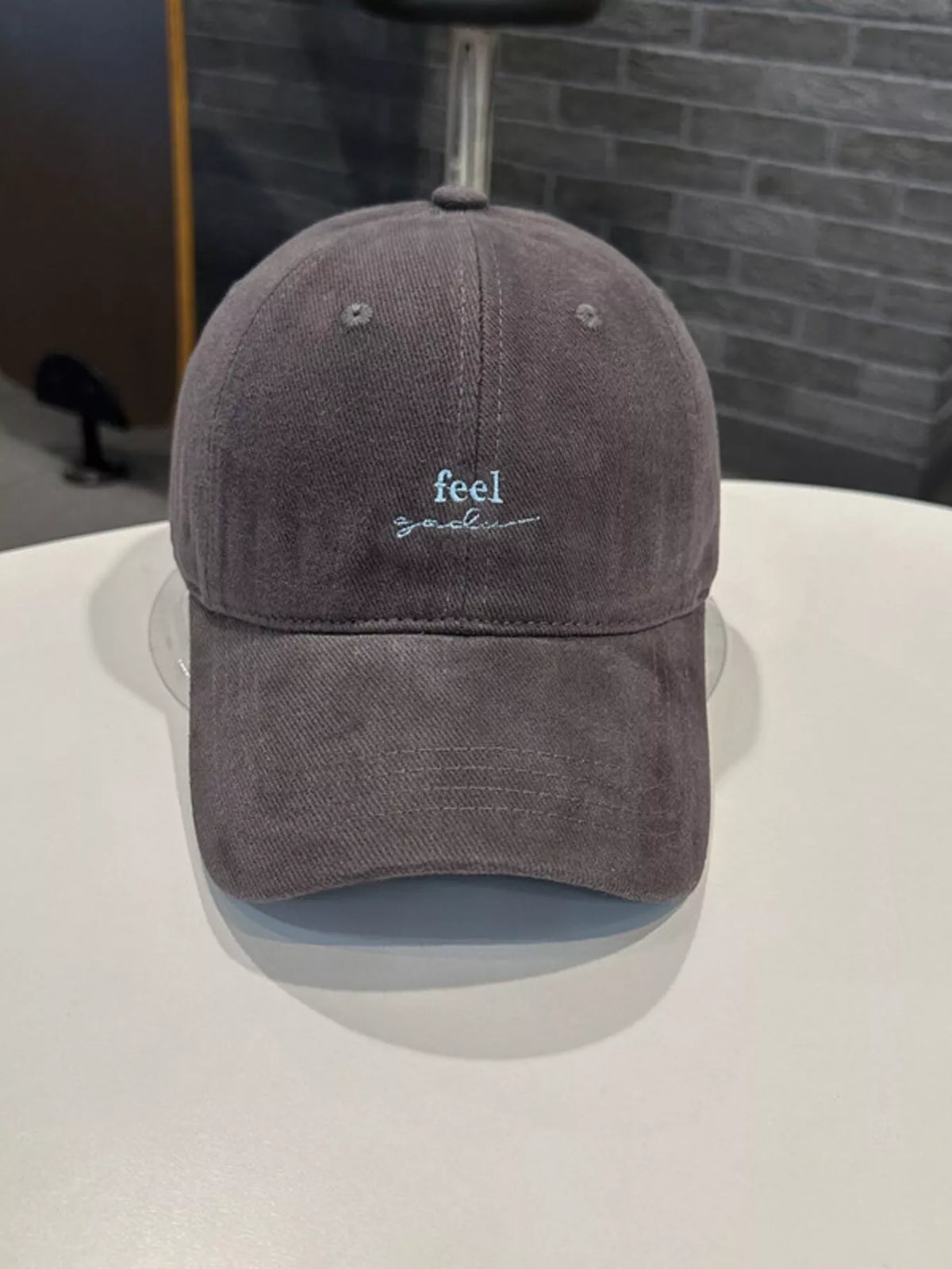 Close up of embroidery stitching on cap