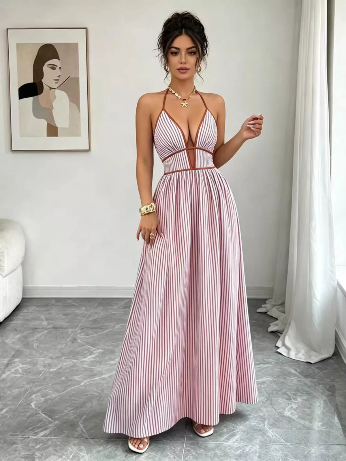 Striped halter maxi dress hem movement detail
