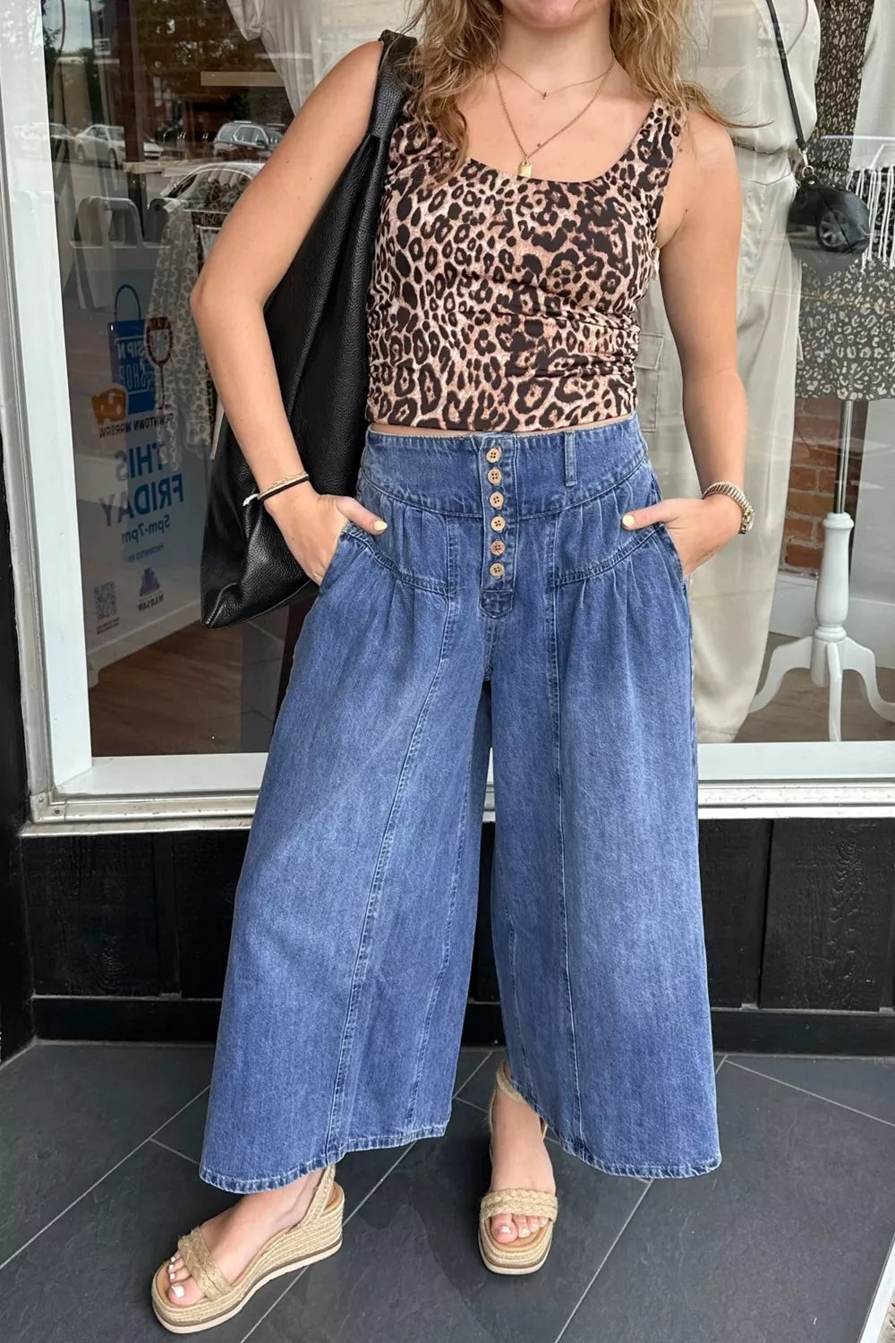 High waisted button fly wide leg jeans front view