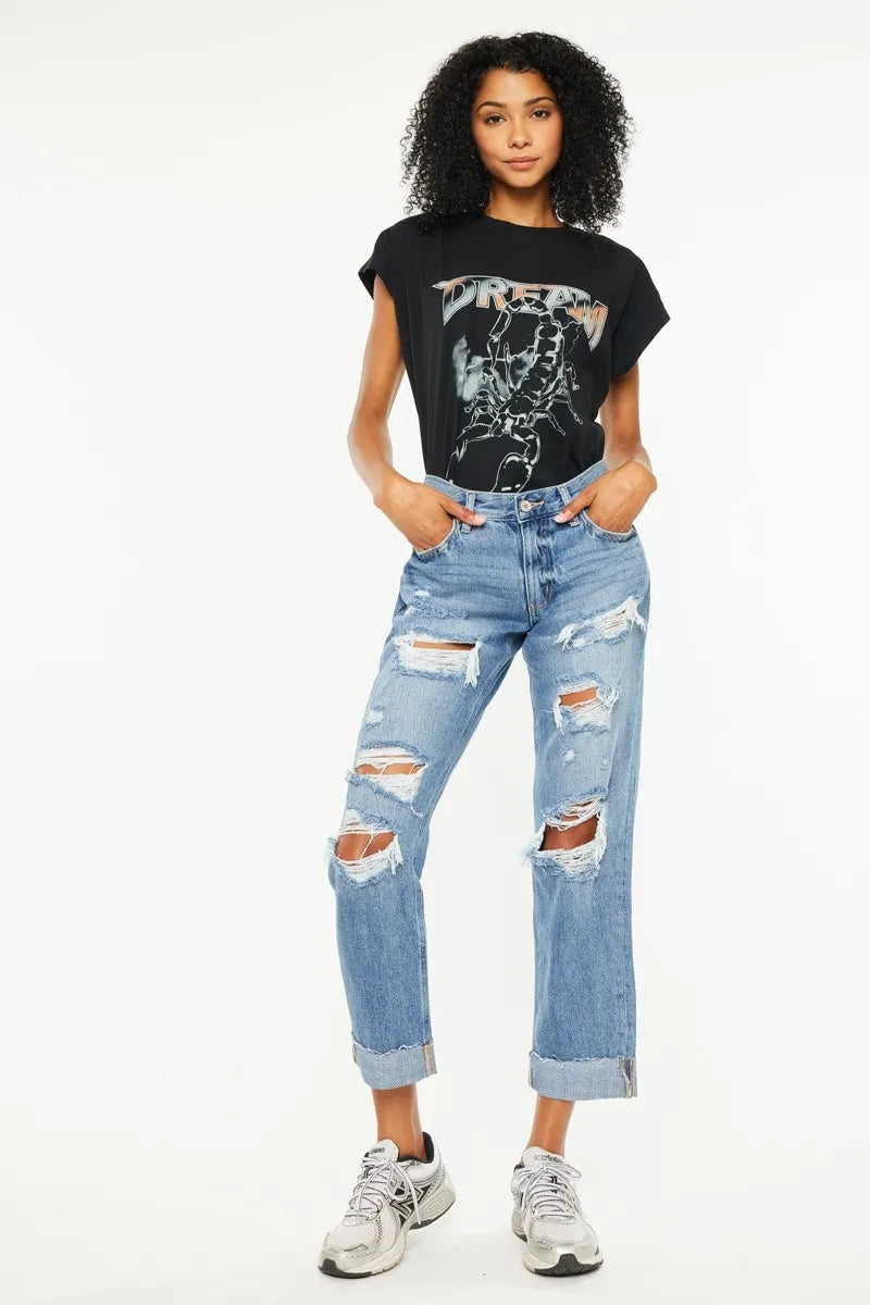 Blue mid rise distressed boyfriend jeans front view