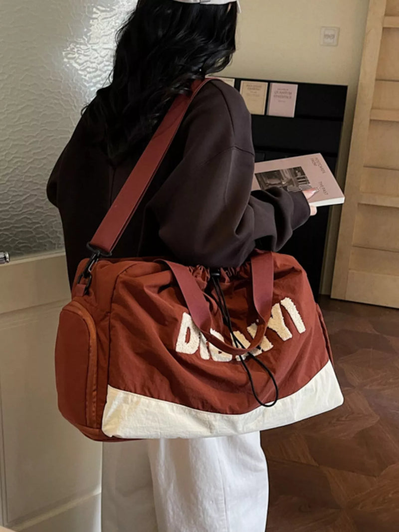 Brick red color block oxford cloth duffel bag front view