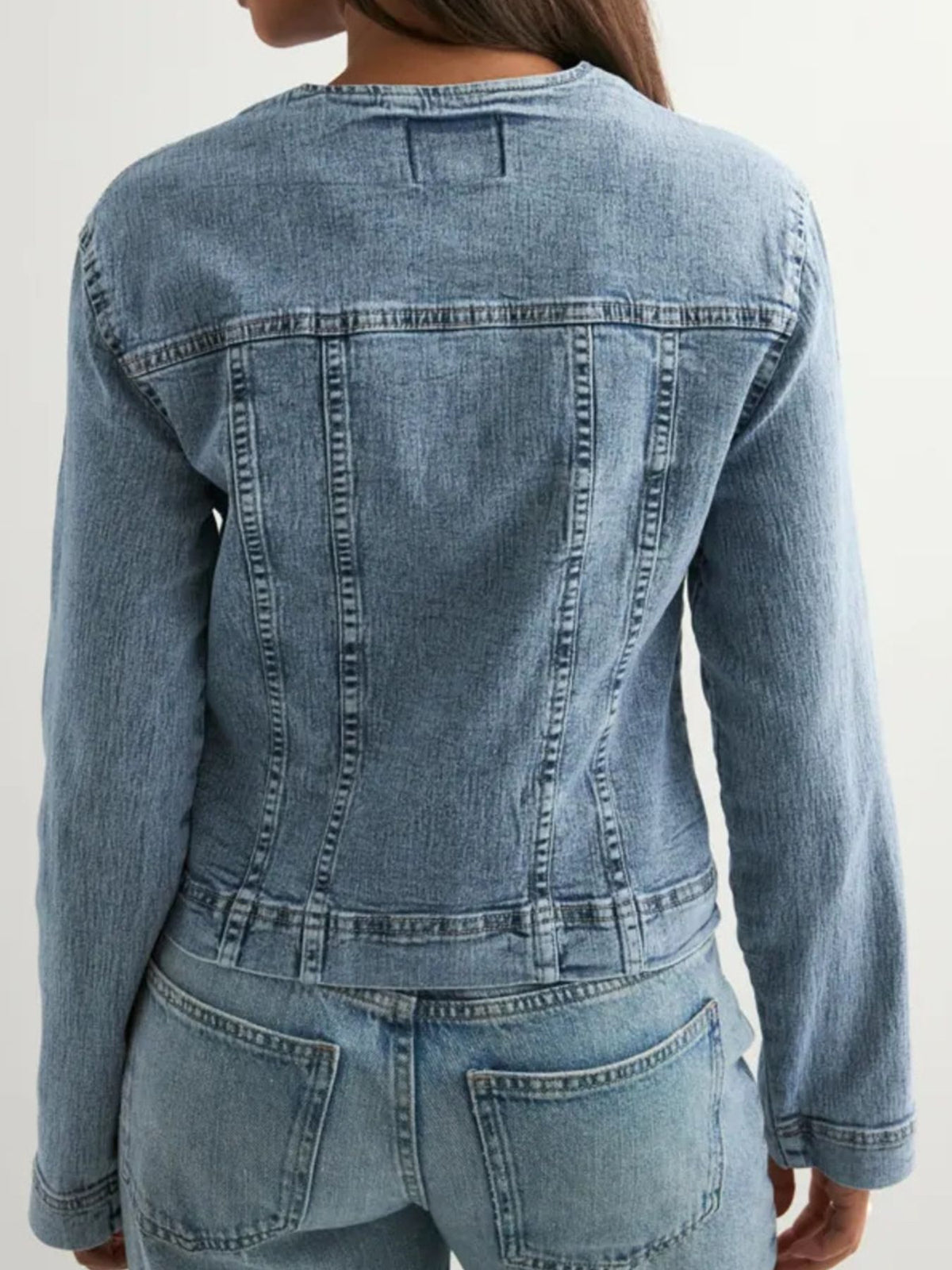 Classic Button Down Denim Jacket in Light Blue close up