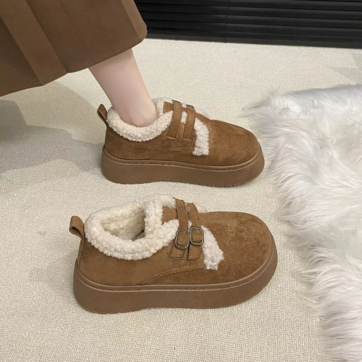double buckle fur lined winter ankle boots full length view