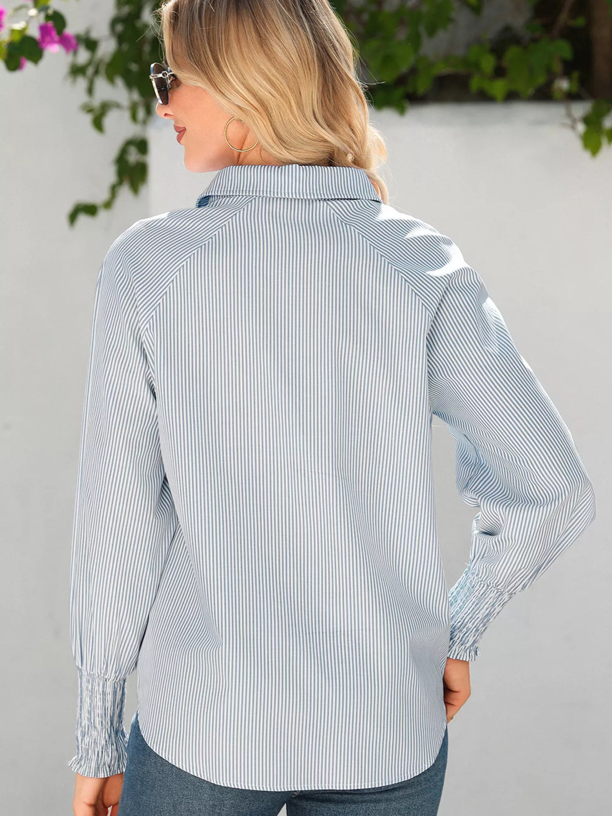 Angled view showing the blouse fit through the body