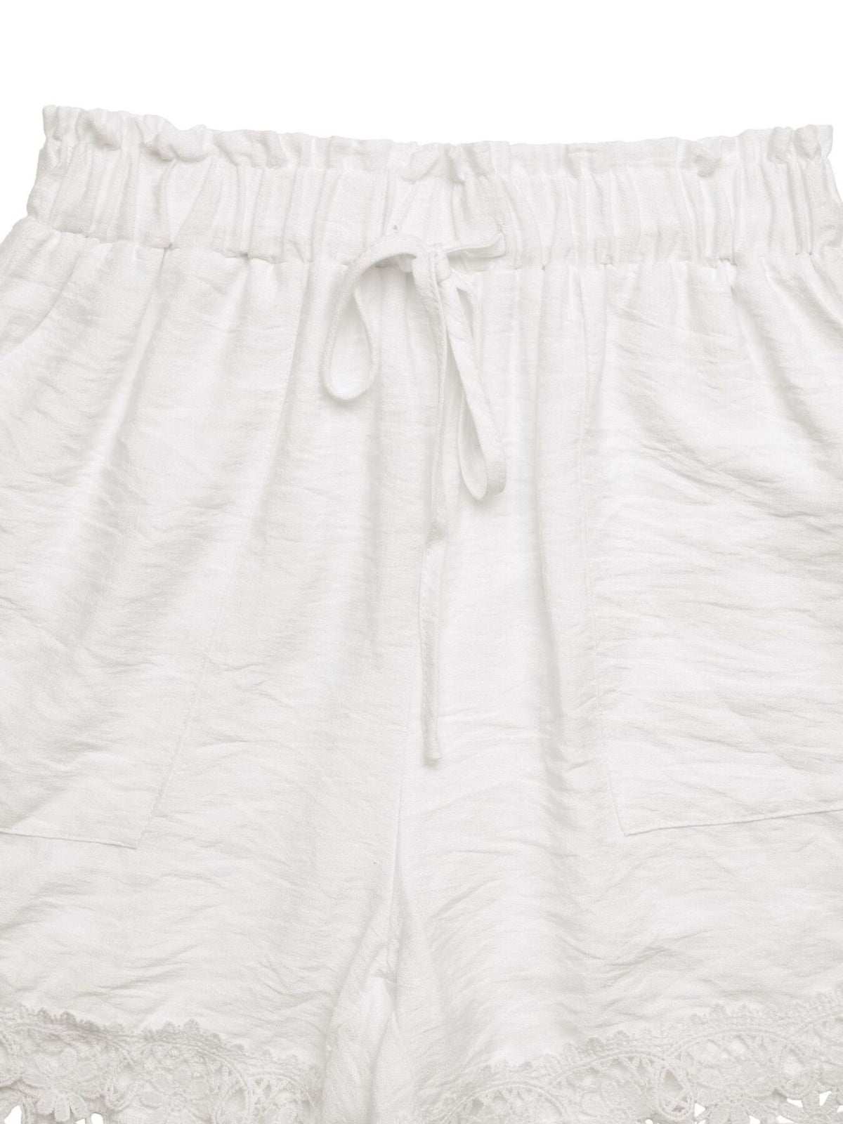 Pocket detail on ivory lace trim shorts