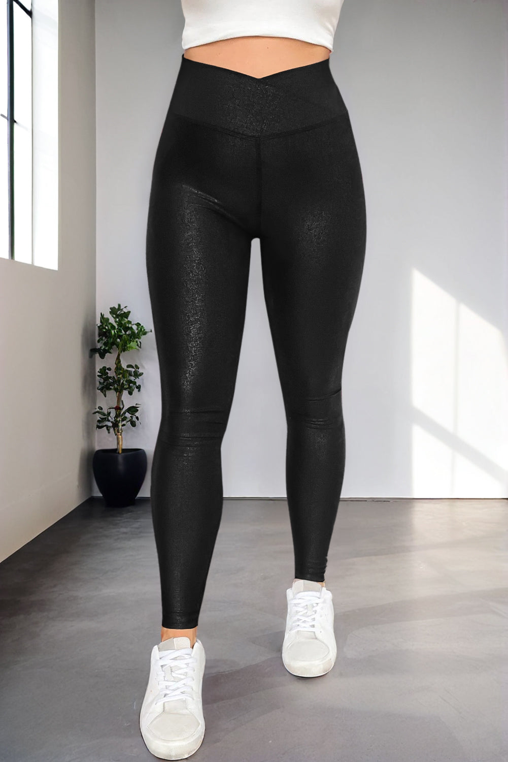 Black faux leather leggings front view