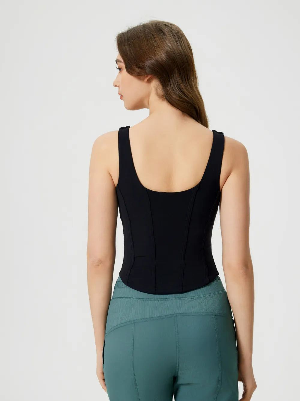Round neck wide strap padded active tank hem detail