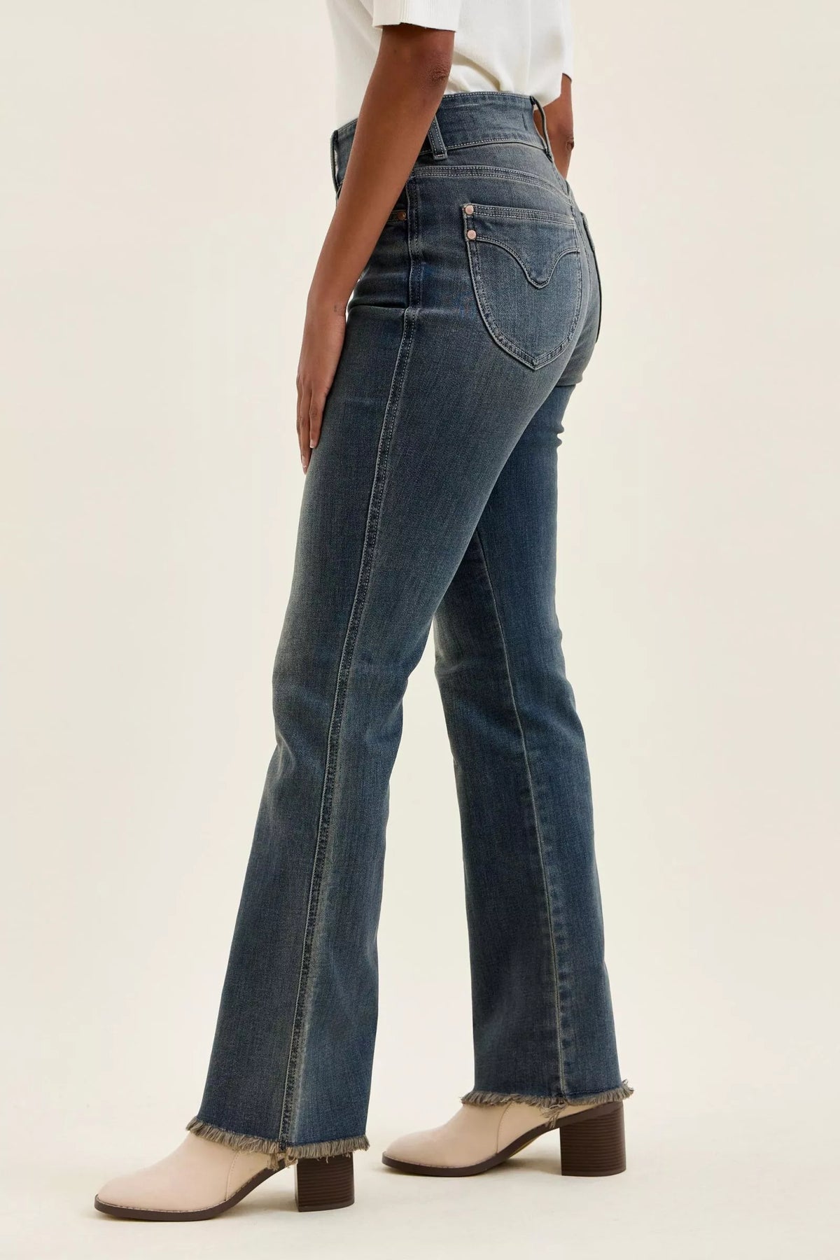 High waist denim side profile in medium wash