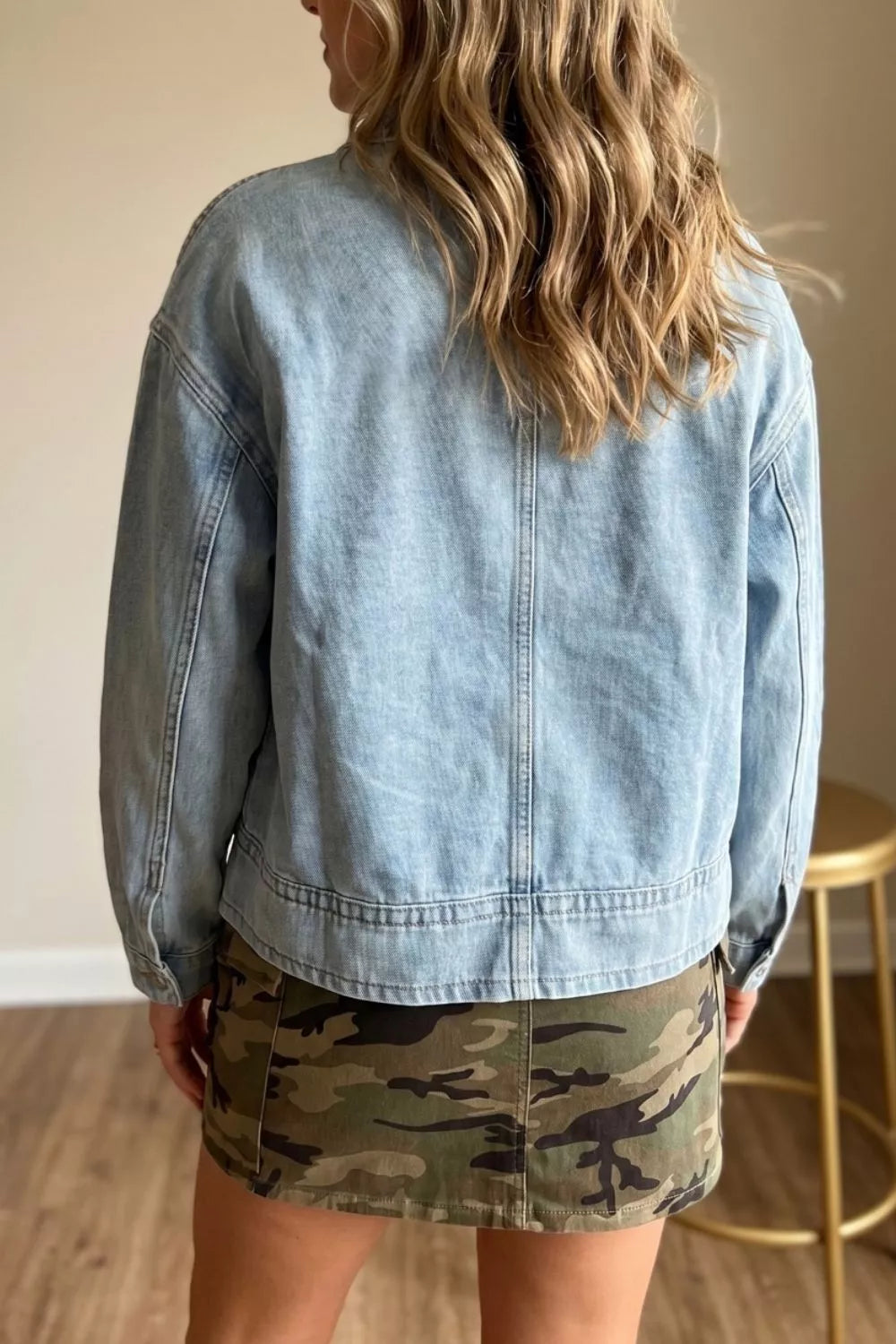 Drawcord hem detail on the light wash denim jacket