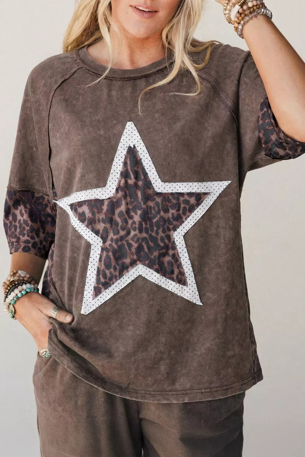 Coffee brown tee with a leopard print star patch shown from the front
