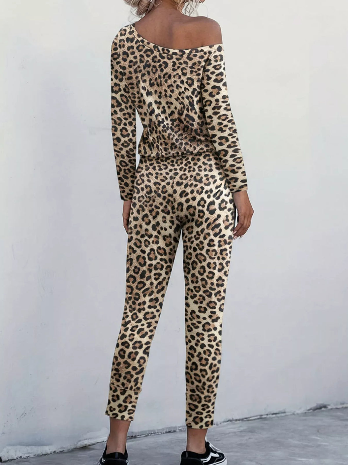 Coordinated one shoulder top and pants outfit