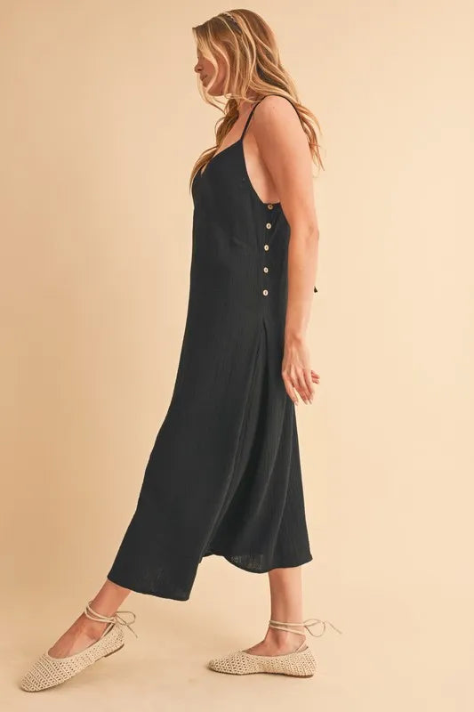 Black cami midi dress styled with sandals