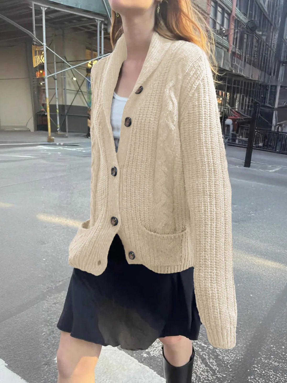 cable knit button up cardigan side profile view