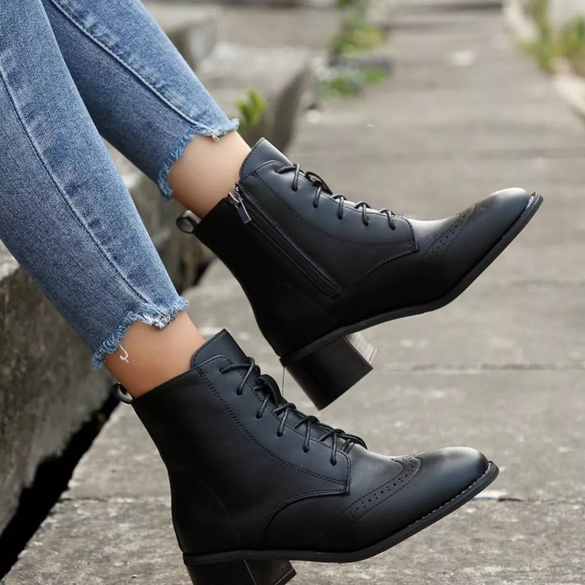 Lace up ankle boots with zipper heel detail