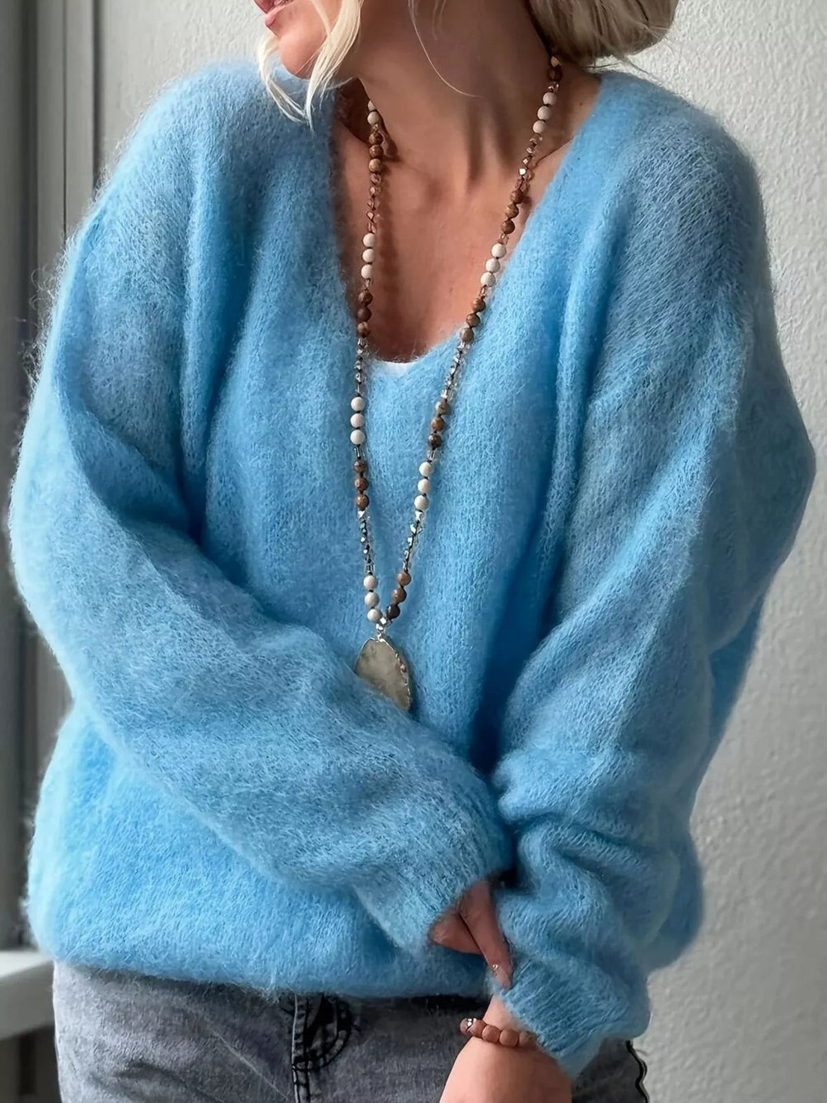 v neck dropped shoulder sweater neckline detail