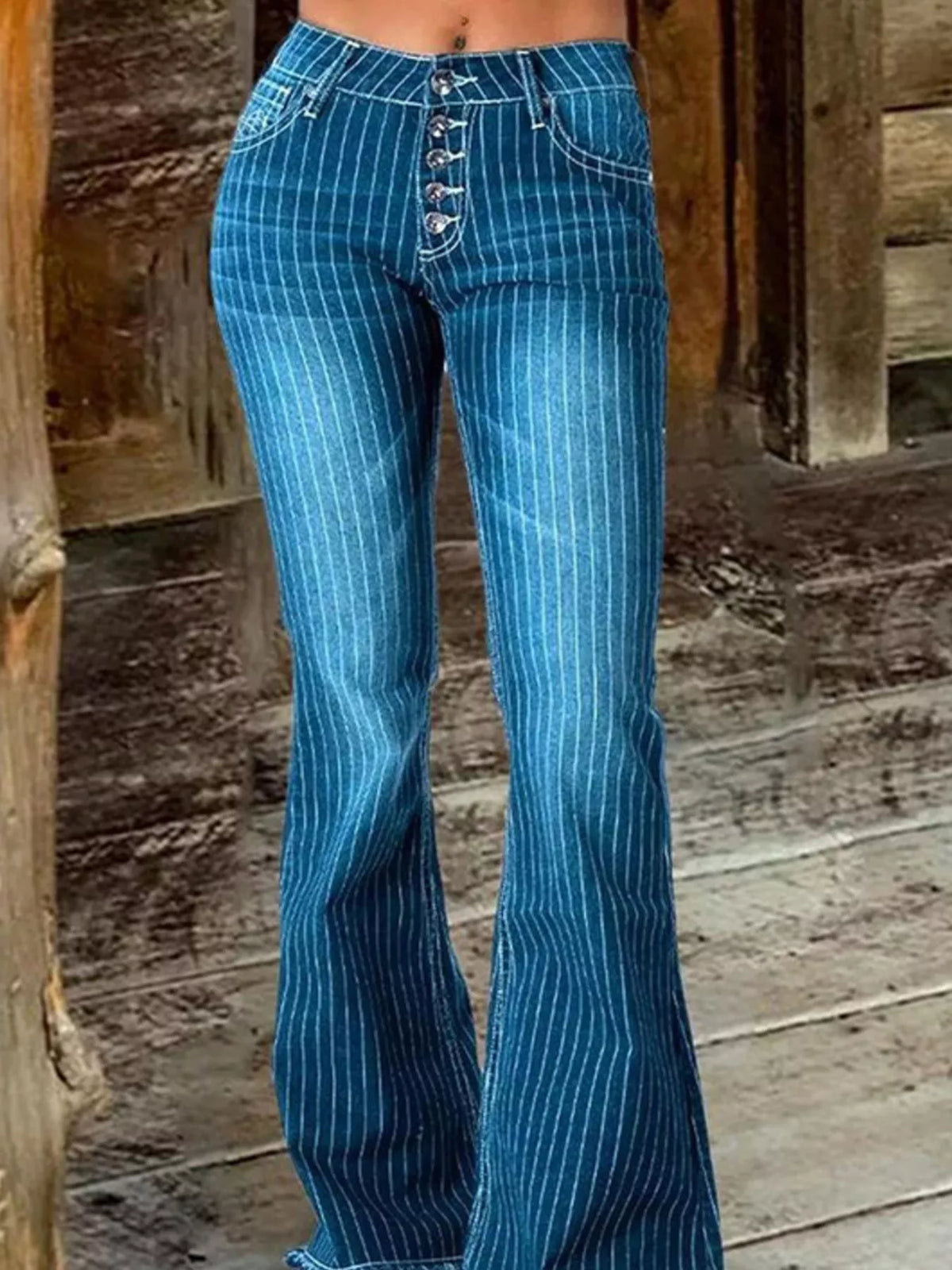 Striped button fly flare jeans front view