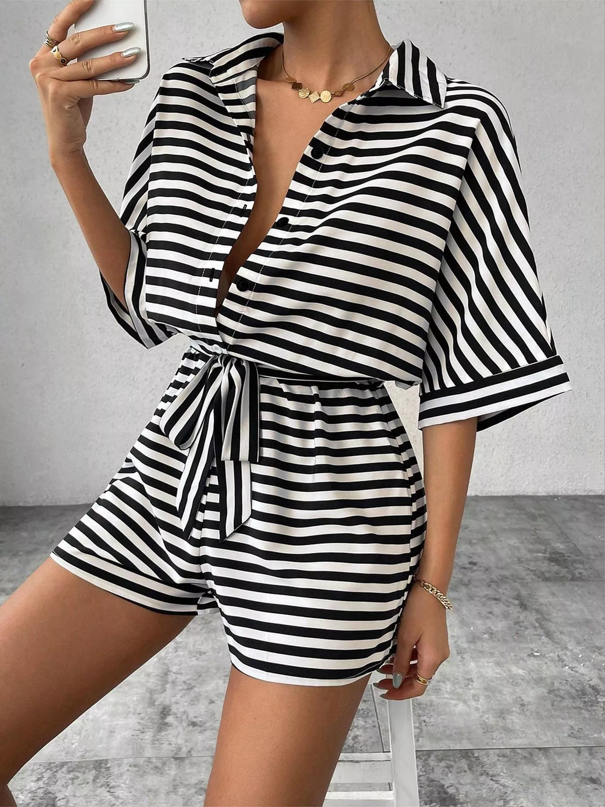 Striped romper in multi color styled for summer