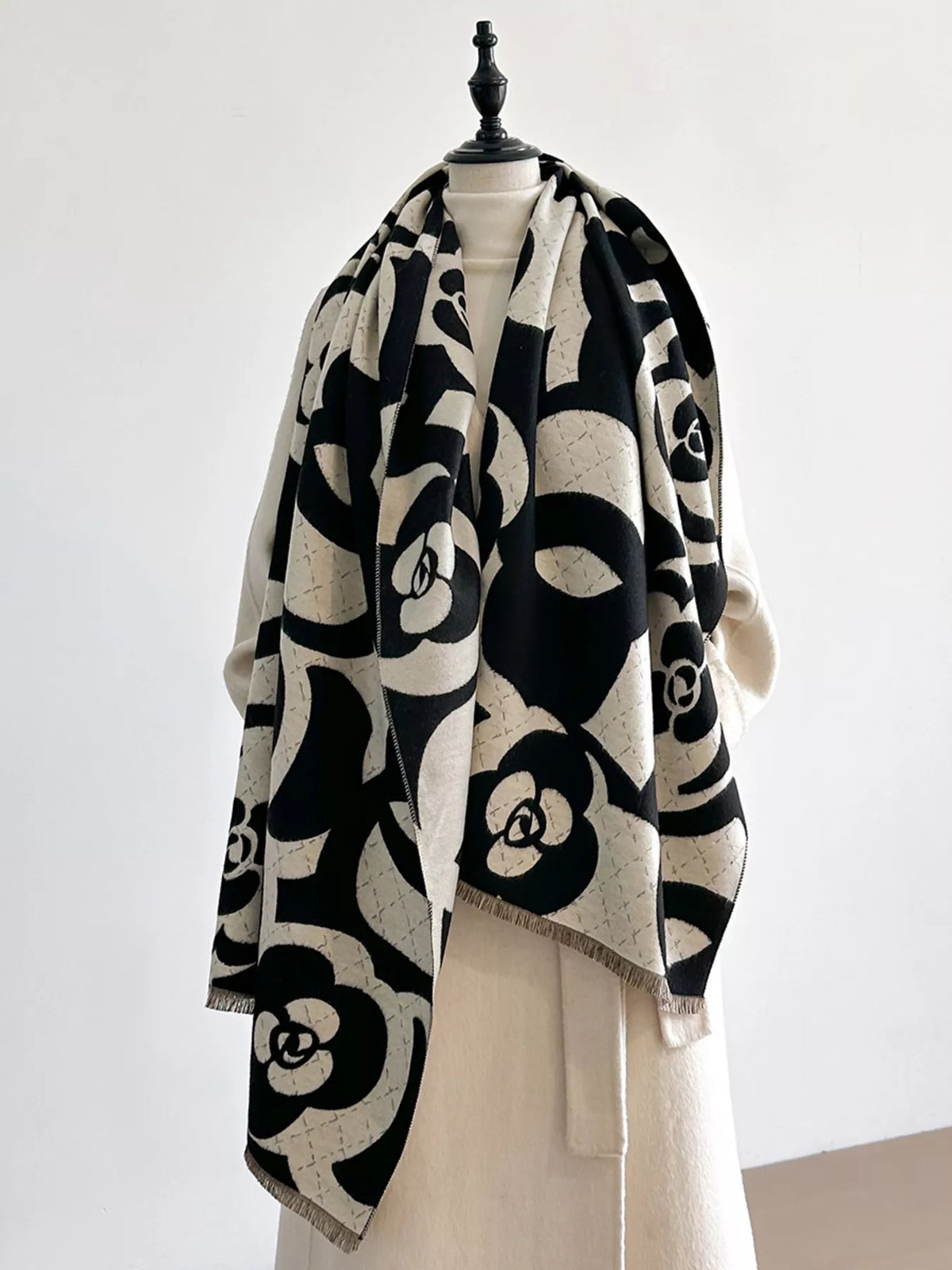 Soft floral patterned scarf detail view