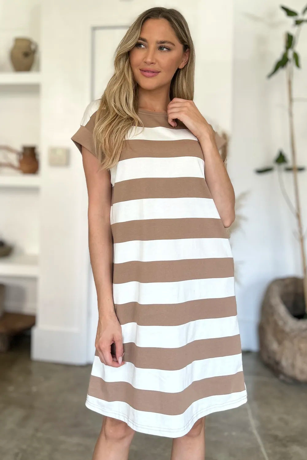 Cap sleeve mini dress styled casually