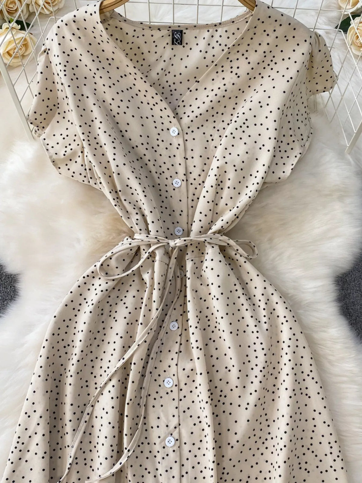 Apricot polka dot button up maxi dress side view