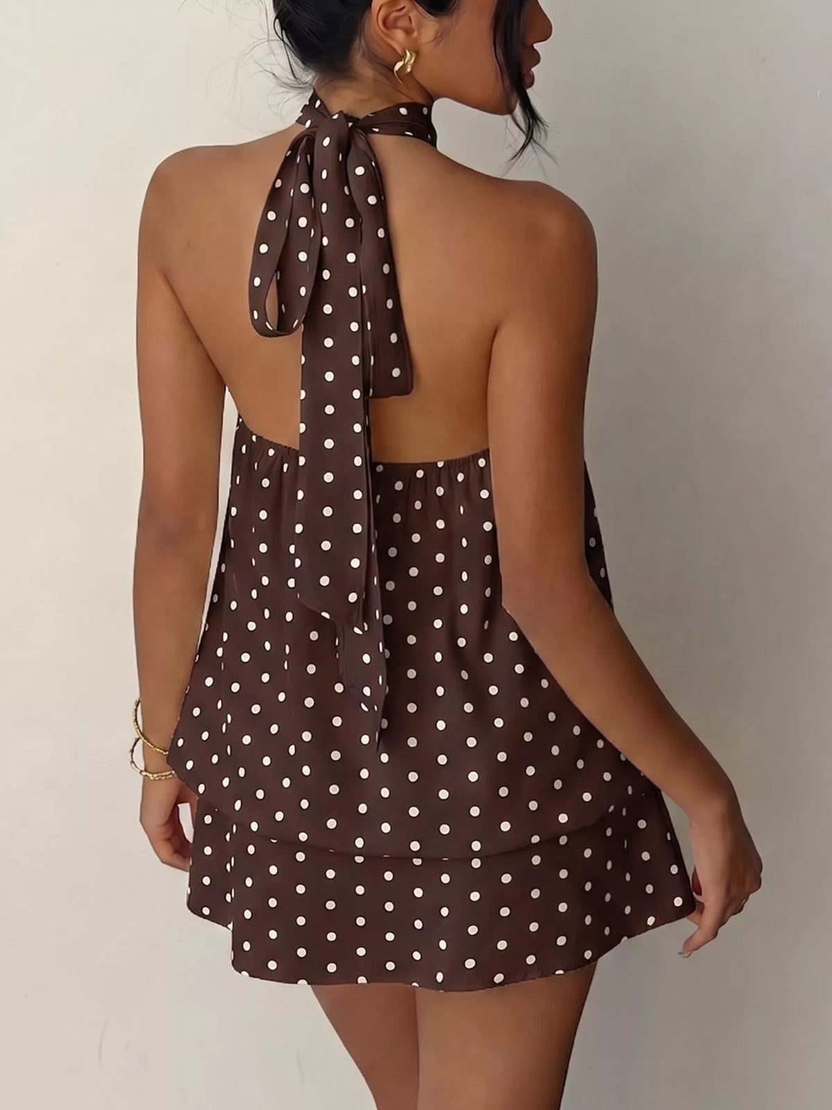 Polka dot mini dress hem detail