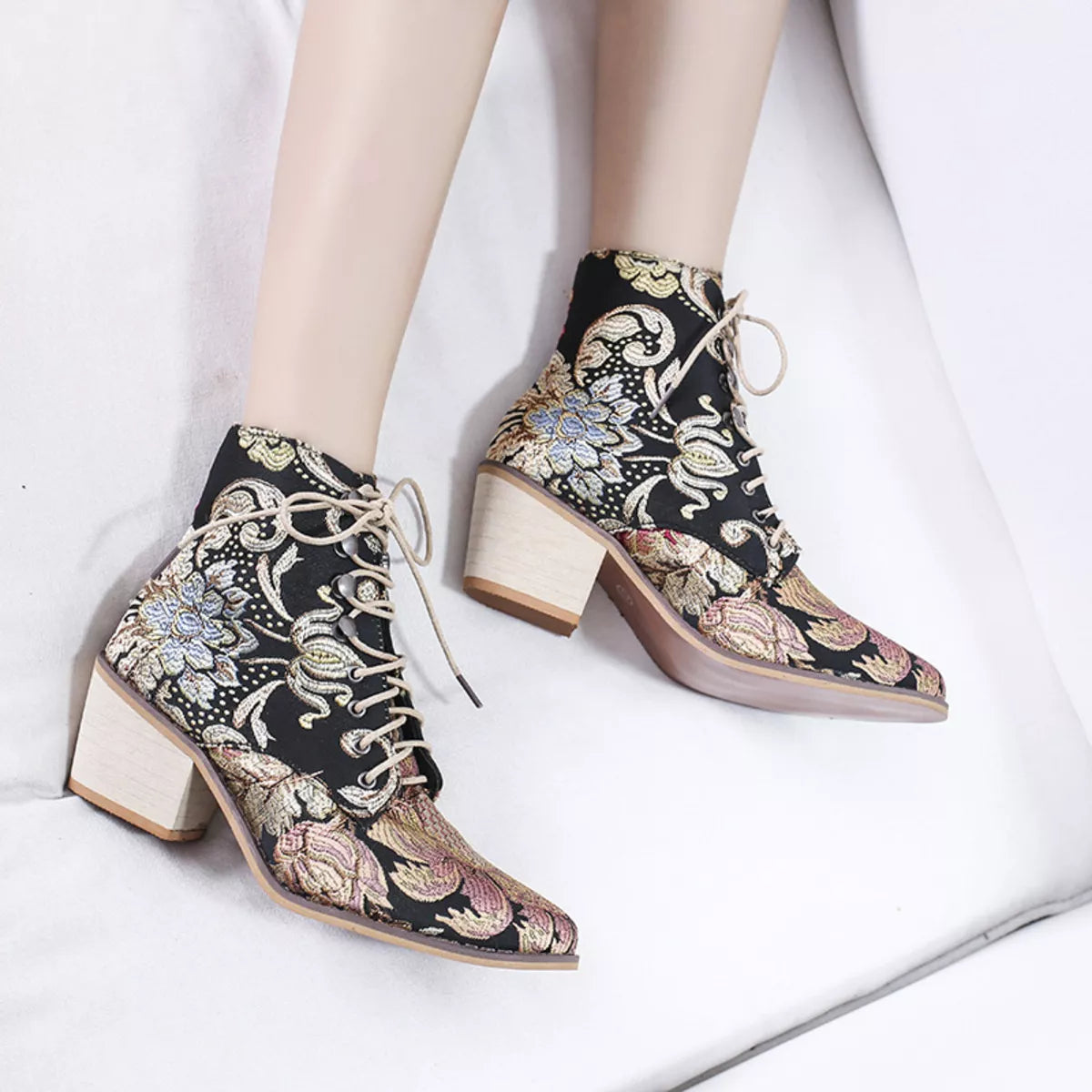 Gold embroidered floral lace up ankle boots heel detail