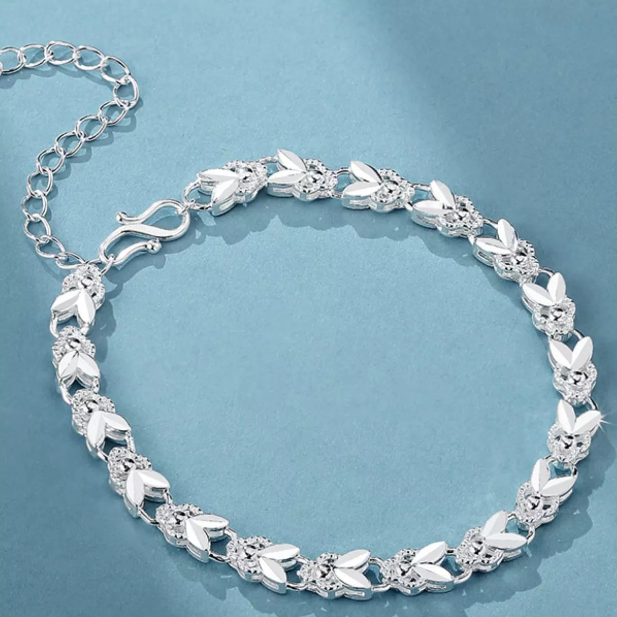 Sterling silver chain bracelet worn on the wrist