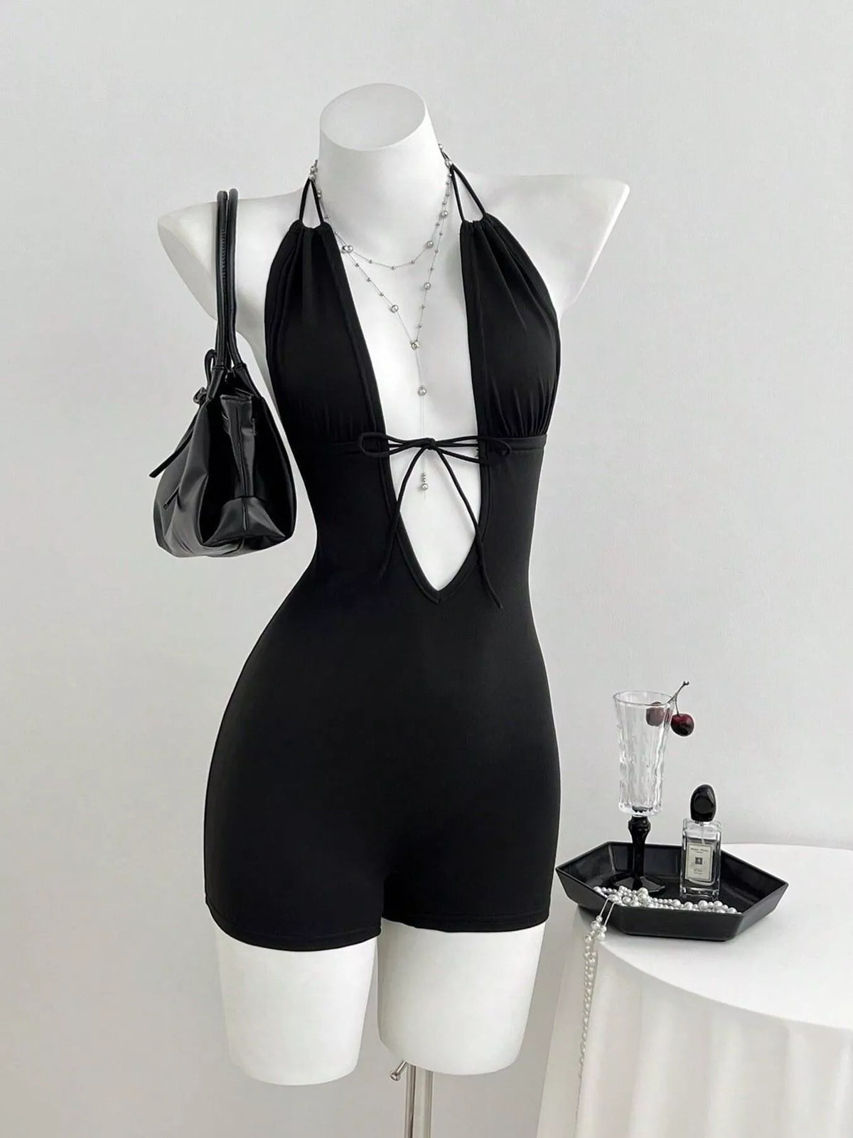 Black halter neck romper front view