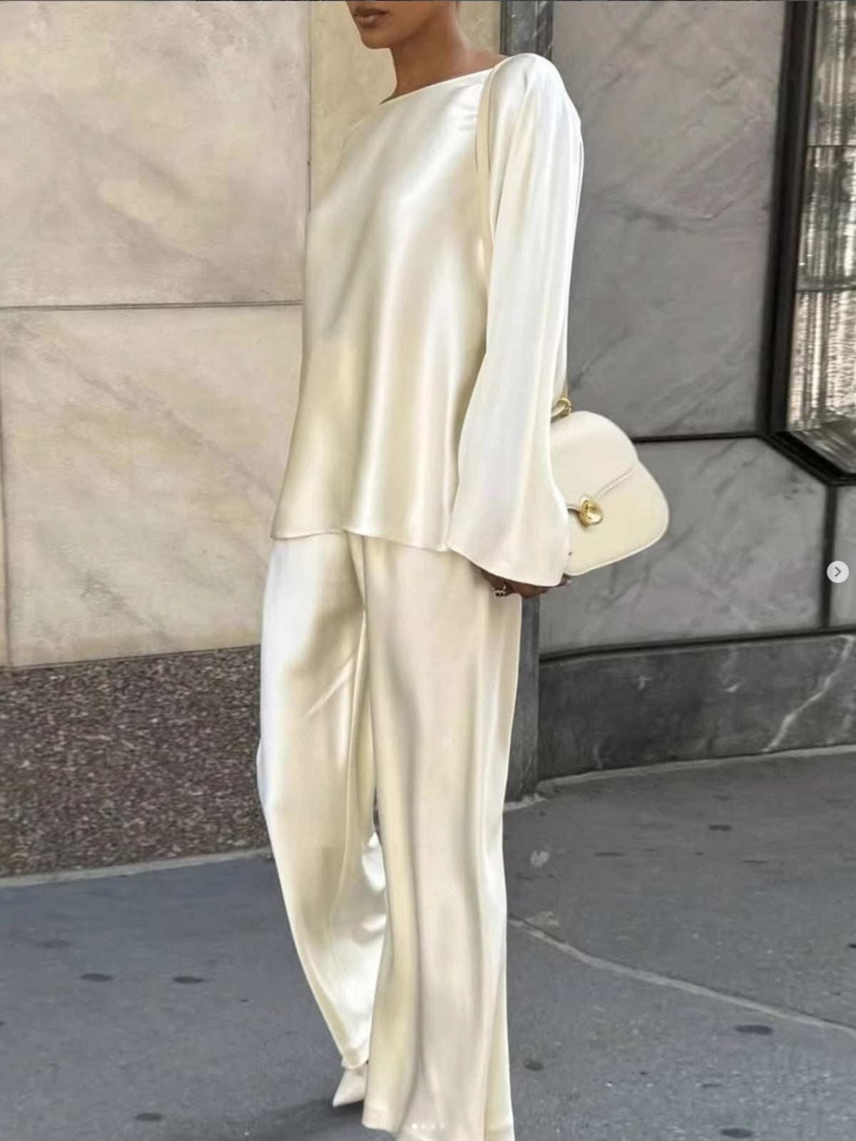 Cream coordinated top and pants set detail