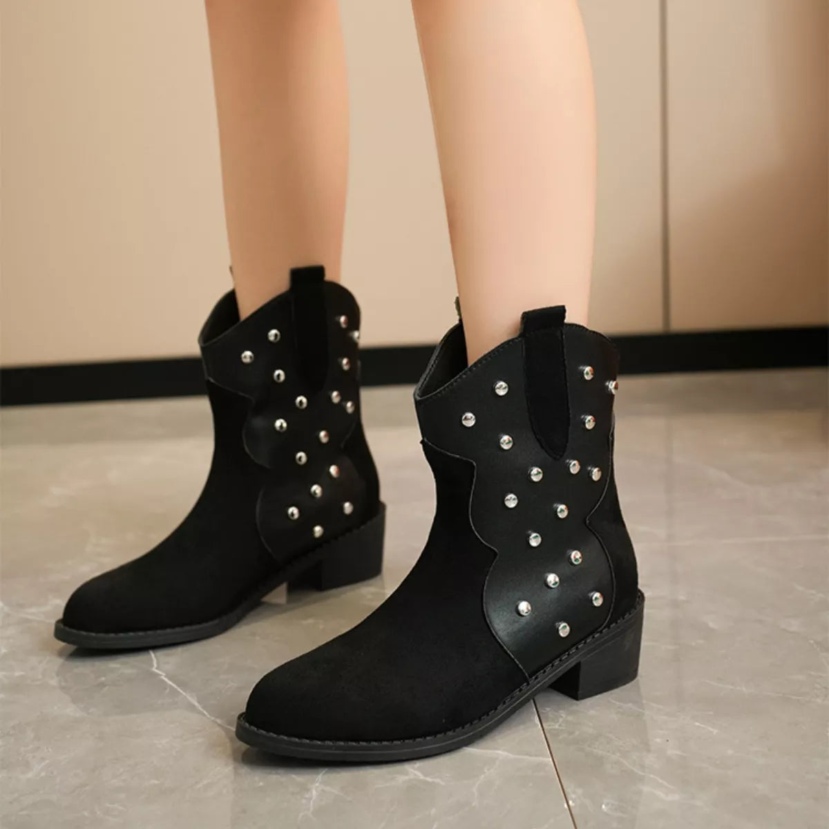 Studded western ankle boots side profile