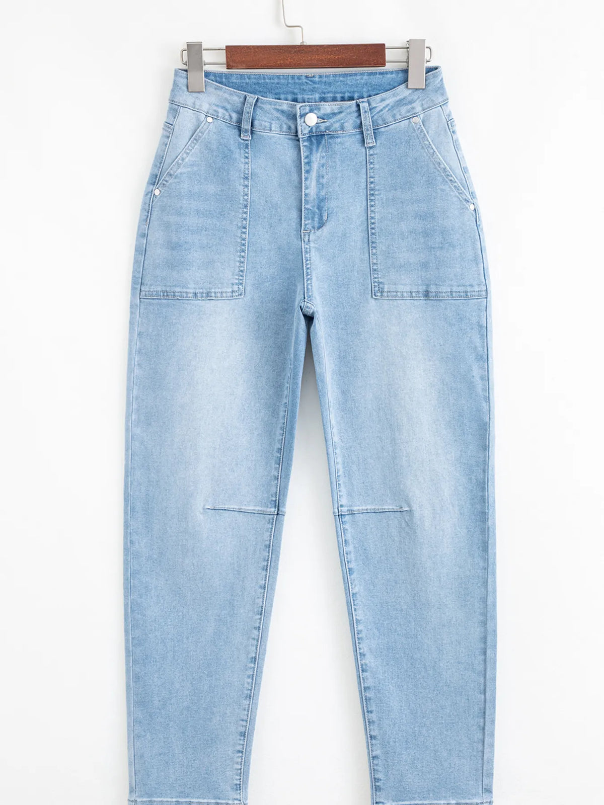 Blue barrel jeans side profile showing rounded leg