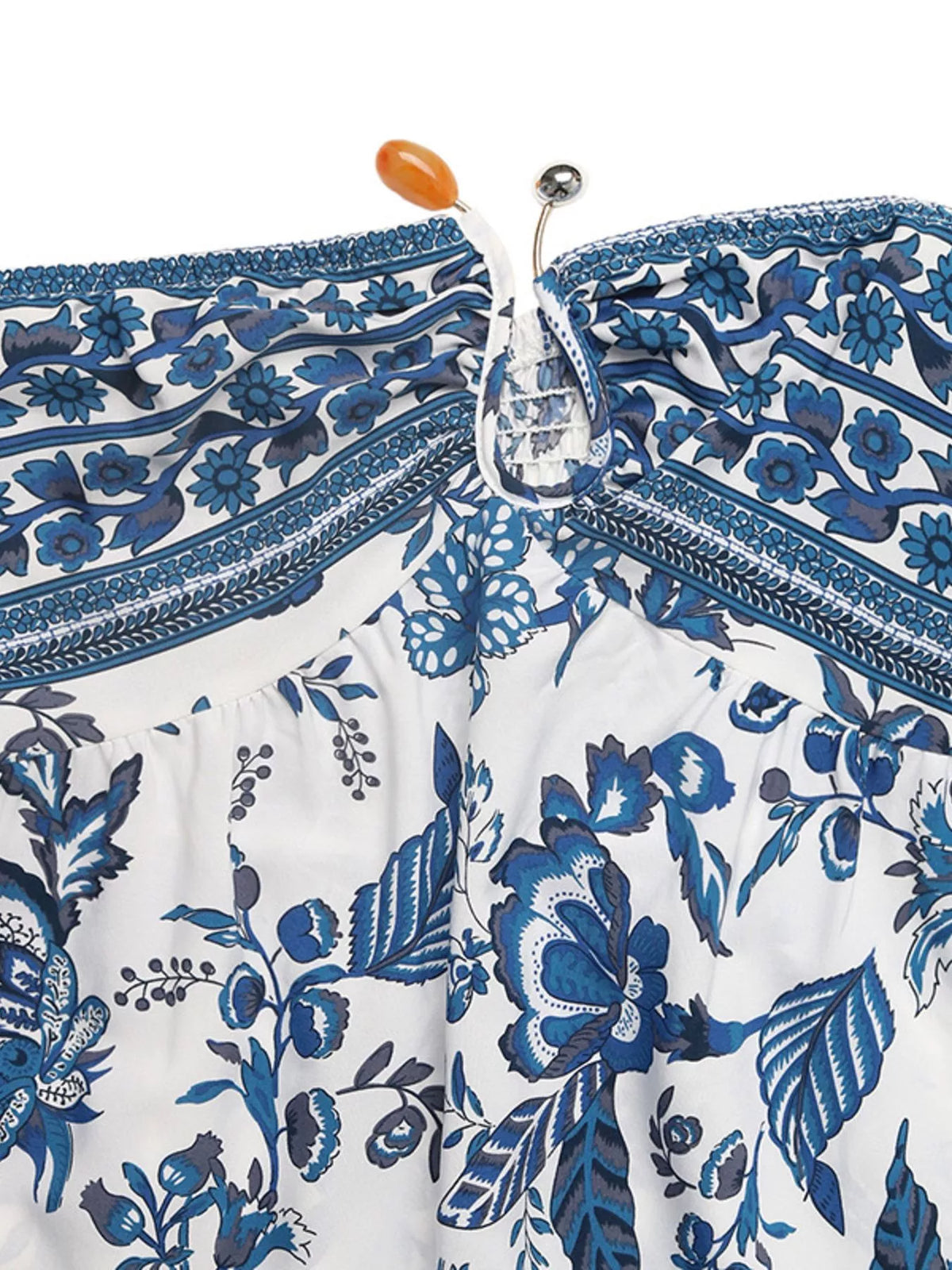 Blue floral strapless maxi dress close up